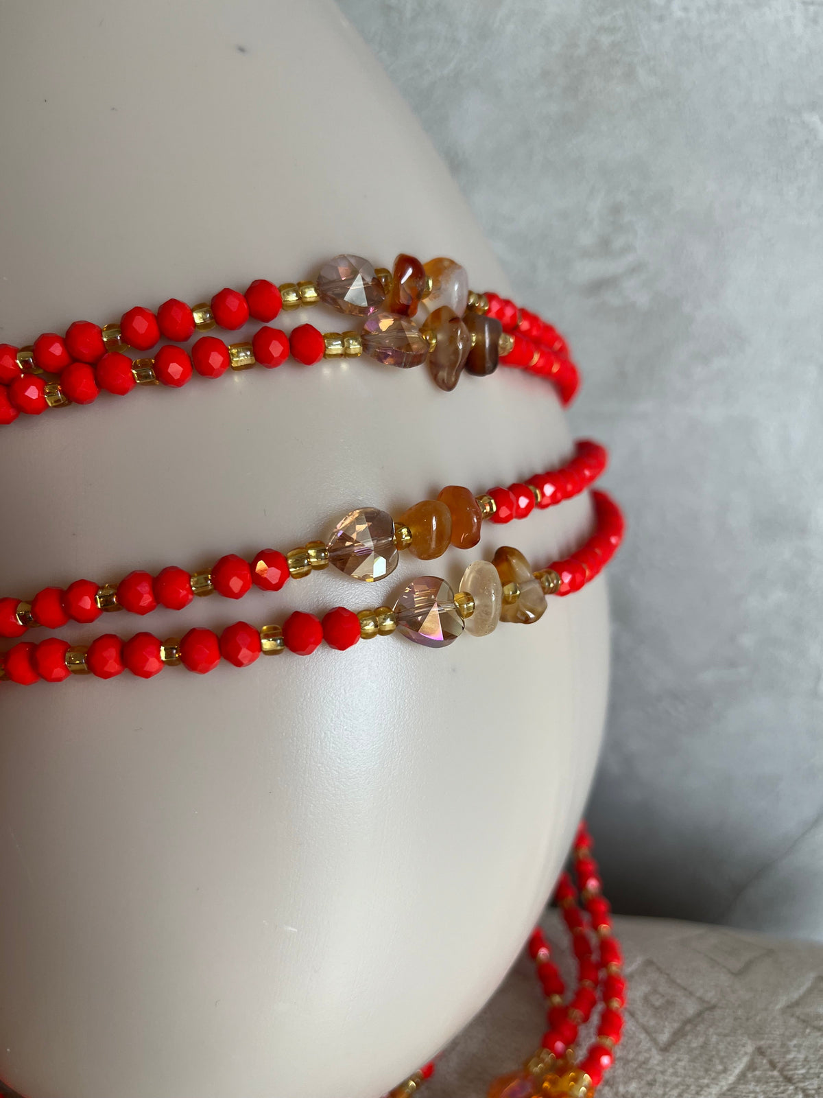 Luxurious Handmade beaded body jewellery Red orange and gold and a touch of black beads