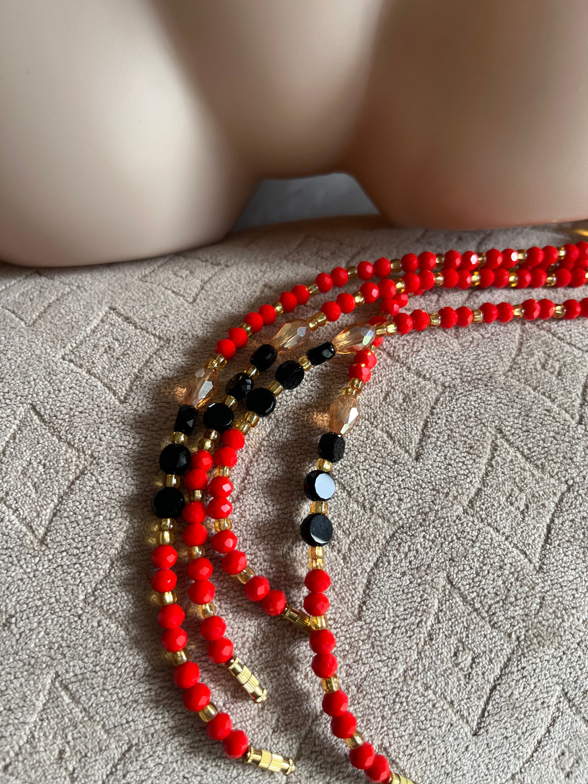 Luxurious Handmade beaded body jewellery Red orange and gold and a touch of black beads