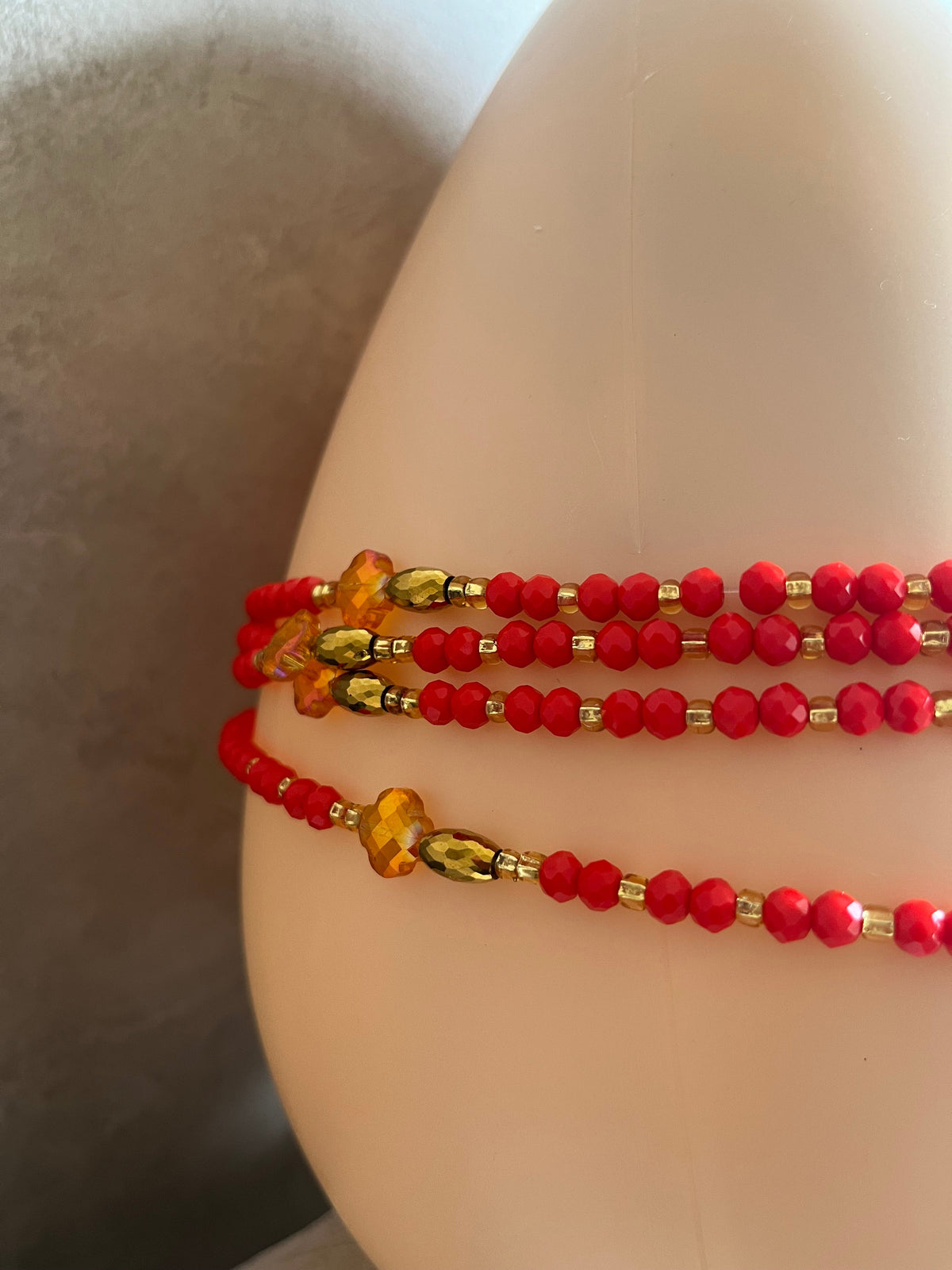 Luxurious Handmade beaded body jewellery Red orange and gold and a touch of black beads