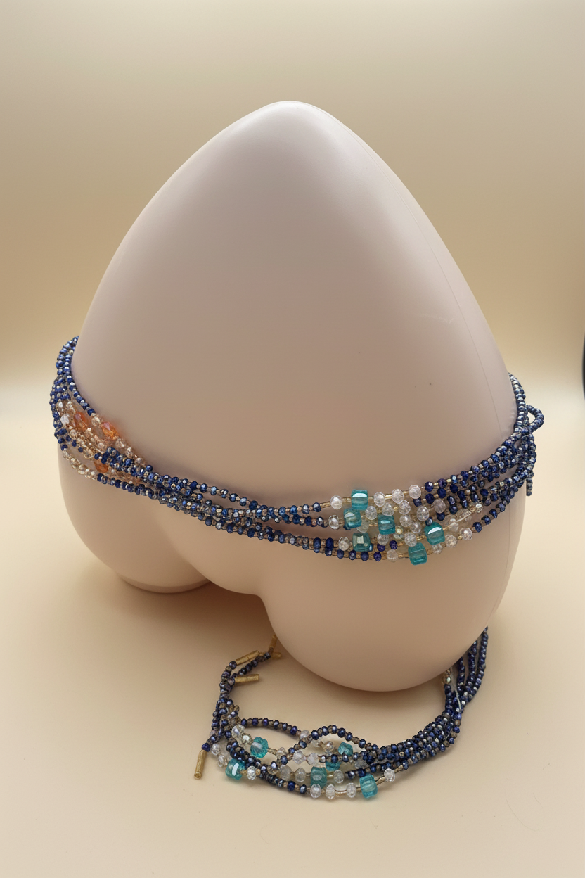 Blue waist beads side angle on cream background