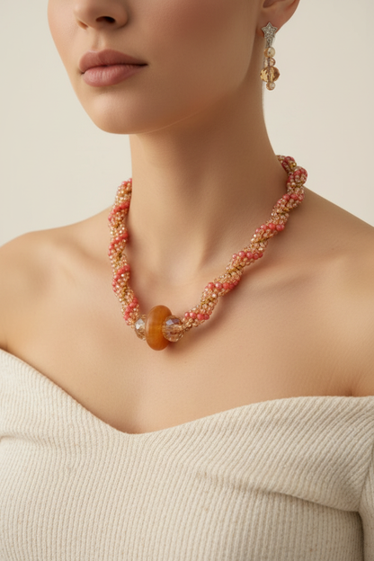 Person wearing crystal necklace set