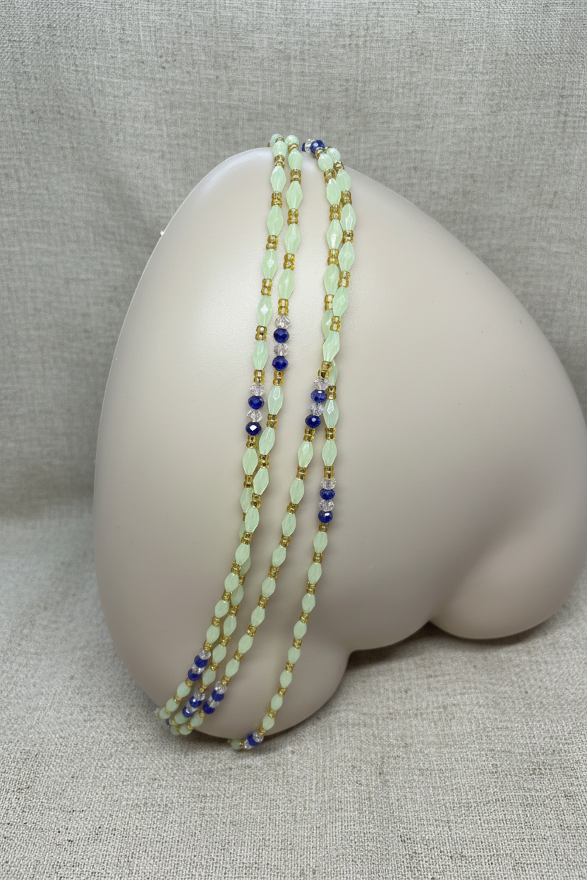 Waist chain on linen background